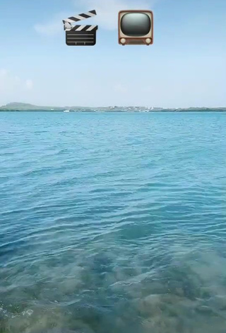 3. Hot Adriana Valcárcel in Yellow Bikini in the Sea