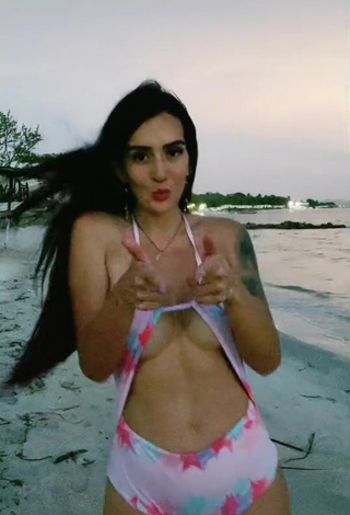 1. Irresistible Adriana Valcárcel in Floral Swimsuit at the Beach (Side Boob)