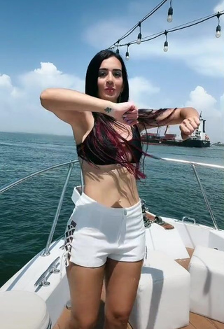 2. Irresistible Adriana Valcárcel in Black Bikini Top on a Boat