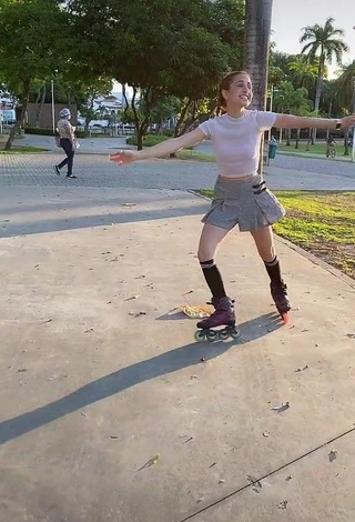 Hot Andressa Fontinele in White Crop Top in a Street while doing Sports Exercises