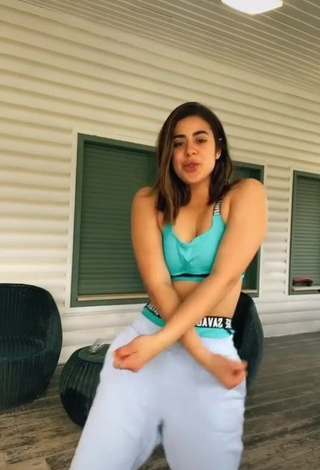 Captivating Angel Baranes Shows Cleavage in Green Sport Bra