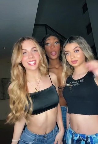 3. Arianna Flowers in Cute Black Crop Top