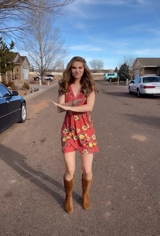 Erotic Ariel Sadler in Floral Dress in a Street