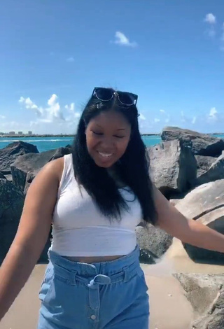 1. Erotic Asha Christine in White Crop Top at the Beach