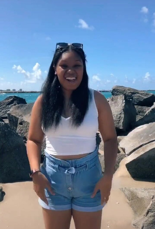 Erotic Asha Christine in White Crop Top at the Beach