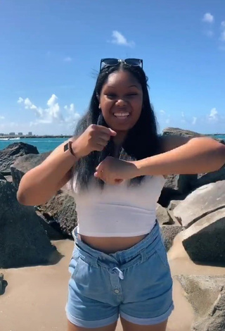 3. Erotic Asha Christine in White Crop Top at the Beach