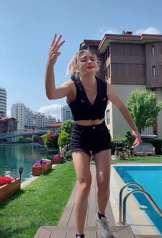 1. Erotic Asya Burcum in Black Crop Top at the Pool