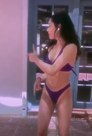 1. Lovely Avani Gregg in Violet Bikini