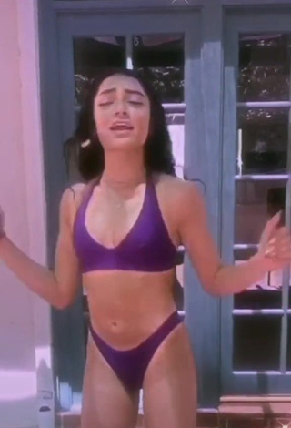 2. Lovely Avani Gregg in Violet Bikini