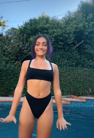 Attractive Avani Gregg in Black Bikini at the Swimming Pool