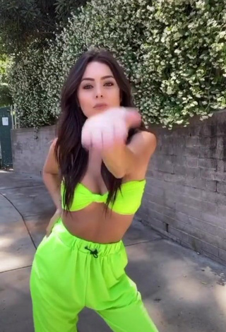 Irresistible Brooke Bridges Shows Cleavage in Lime Green Crop Top