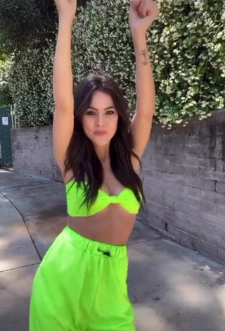 3. Irresistible Brooke Bridges Shows Cleavage in Lime Green Crop Top