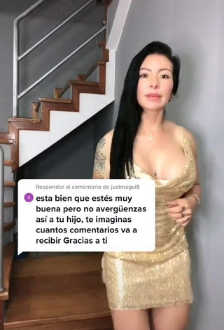 1. Erotic Adriana Espitia Shows Cleavage in Golden Dress