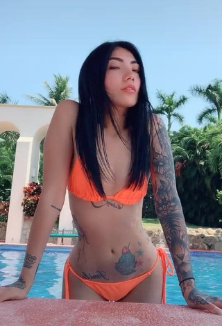 1. Erotic Nicole Amado in Electric Orange Bikini at the Pool