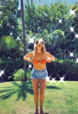 Captivating Ashley Tisdale in Orange Bikini Top