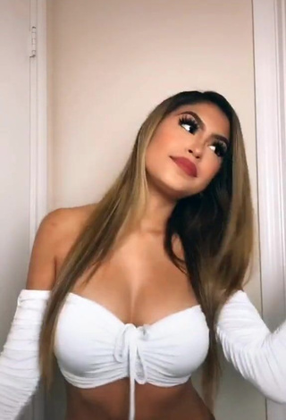 Elegant Desiree Montoya Shows Cleavage in White Crop Top