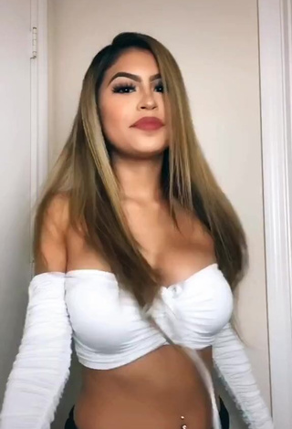 3. Elegant Desiree Montoya Shows Cleavage in White Crop Top