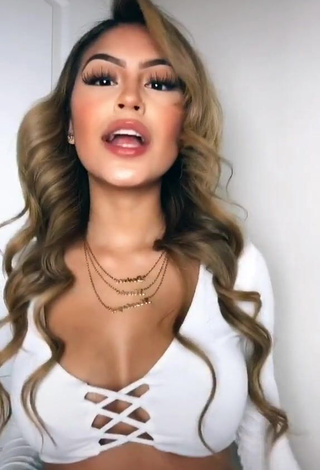 Fine Desiree Montoya Shows Cleavage in Sweet White Crop Top