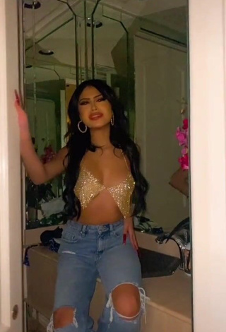 1. Desiree Montoya Shows Cleavage in Seductive Silver Crop Top