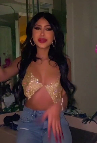 2. Desiree Montoya Shows Cleavage in Seductive Silver Crop Top