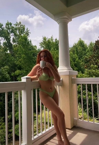 1. Sweetie Faith Collins in Green Bikini on the Balcony