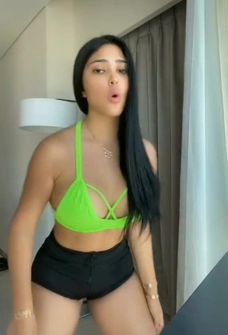 2. Beautiful Franjomar Shows Cleavage in Sexy Green Crop Top