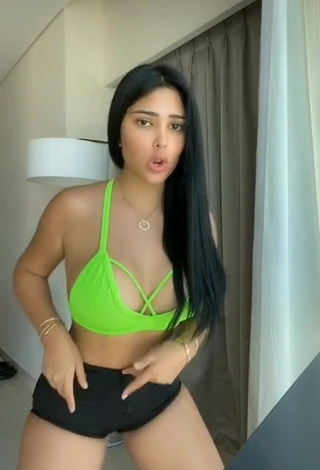 3. Beautiful Franjomar Shows Cleavage in Sexy Green Crop Top