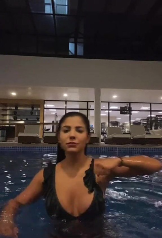 1. Captivating Hariany Nathália Almeida Shows Cleavage in Black Bikini Top at the Pool