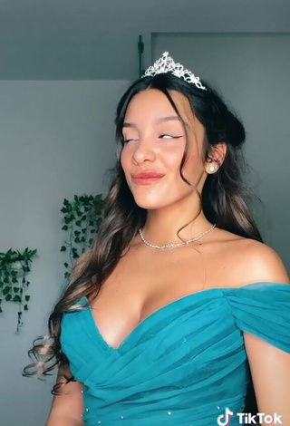 Captivating Iris Ferrari Shows Cleavage in Turquoise Dress