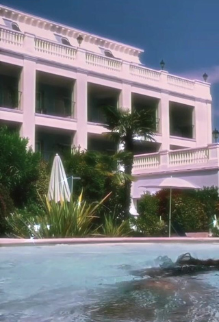 1. Irresistible Iris Ferrari in White Bikini at the Pool