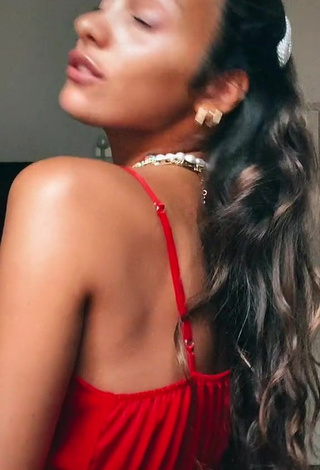 1. Irresistible Iris Ferrari Shows Cleavage in Red Dress