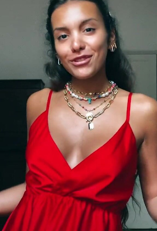 Irresistible Iris Ferrari Shows Cleavage in Red Dress