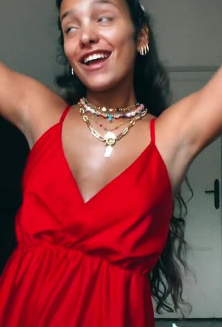 3. Irresistible Iris Ferrari Shows Cleavage in Red Dress