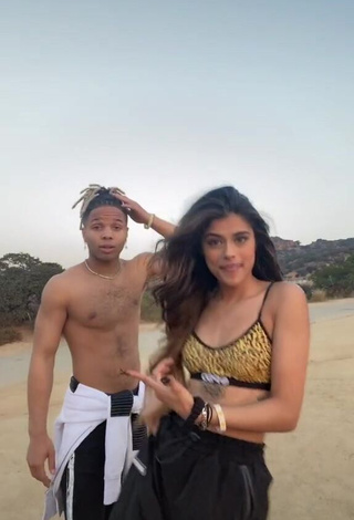 1. Erotic Nupur Sharma in Leopard Sport Bra at the Beach