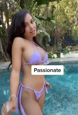 3. Attractive Maddy Belle Shows Cleavage in Purple Bikini at the Pool (Side Boob)