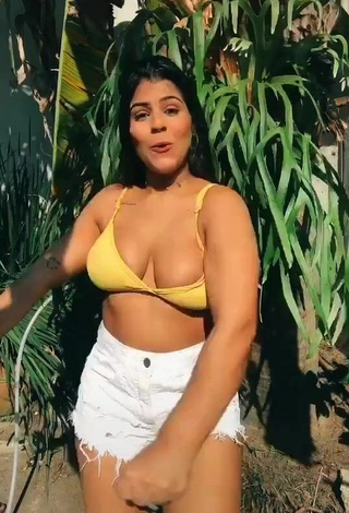 1. Magnificent Julia Antunes Shows Cleavage in Yellow Bikini Top