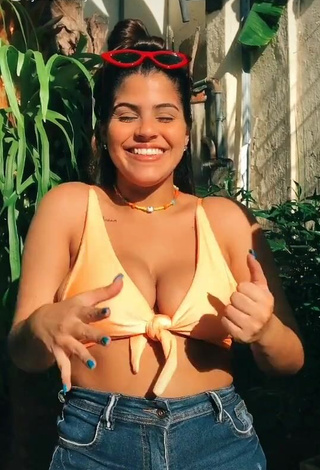 1. Dazzling Julia Antunes in Inviting Orange Bikini Top and Bouncing Boobs