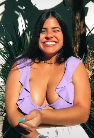 3. Julia Antunes Shows Cleavage in Erotic Purple Bikini Top