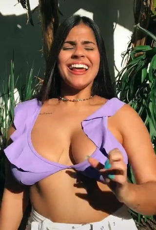 2. Pretty Julia Antunes Shows Cleavage in Purple Bikini Top