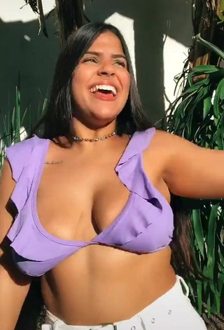 3. Pretty Julia Antunes Shows Cleavage in Purple Bikini Top