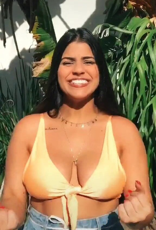 1. Alluring Julia Antunes Shows Cleavage in Erotic Yellow Bikini Top