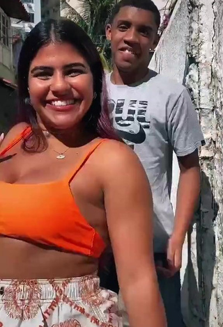 Hottest Julia Antunes Shows Cleavage in Orange Crop Top