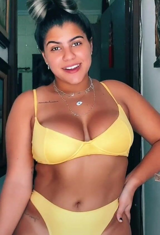 1. Really Cute Julia Antunes Shows Cleavage in Yellow Bikini