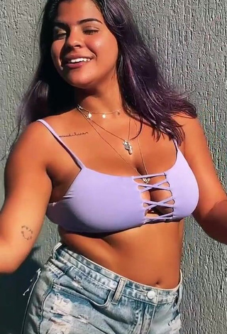 3. Sweetie Julia Antunes Shows Cleavage in Purple Crop Top