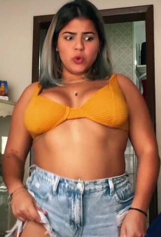 1. Julia Antunes Shows Cleavage in Alluring Yellow Bikini Top and Bouncing Boobs