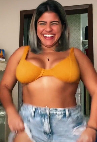 Julia Antunes Shows Cleavage in Alluring Yellow Bikini Top and Bouncing Boobs