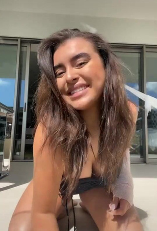 1. Erotic Kalani Hilliker Shows Cleavage in Black Swimsuit