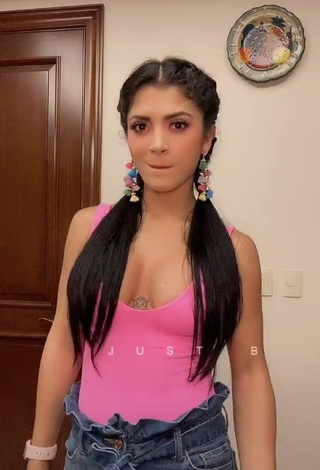 3. Erotic Kimberly Flores Shows Cleavage in Pink Top