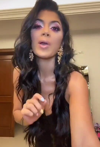 Hot Kimberly Flores Shows Cleavage in Black Dress