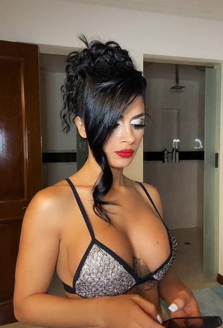 1. Sexy Kimberly Flores Shows Cleavage in Silver Bikini Top